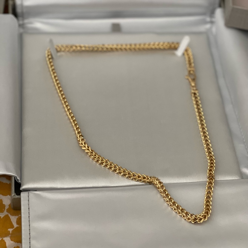 10k Solid Franco Yellow Gold chain with a lobster claw lock.